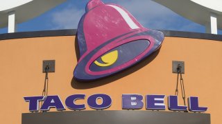 In this Dec. 31, 2014, file photo, a Taco Bell fast food restaurant is seen in New Carrollton, Maryland.