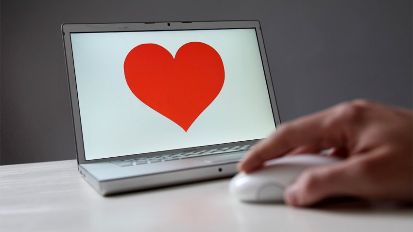 symbolic photo online dating , heart on a notebook