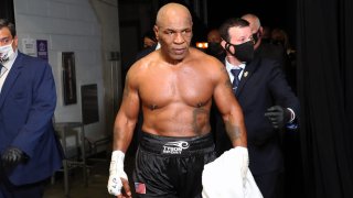 Mike Tyson exits the ring after receiving a split draw against Roy Jones Jr. during Mike Tyson vs Roy Jones Jr. presented by Triller at Staples Center on November 28, 2020 in Los Angeles, California.