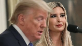 In this April 28, 2020, file photo, White House advisor Ivanka Trump listens to her father U.S. President Donald Trump deliver remarks on supporting small businesses through the Paycheck Protection Program in the East Room of the White House in Washington, D.C.