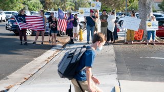 Anti-mask protestors in front of school