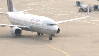File of United Airlines plane on tarmac