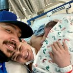 A picture of parents Natalie and Angel Hernandez and their baby boy Ramon who was born on 2:22 p.m. on 2/2/22