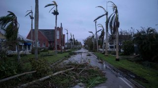 Debris litters a street in the aftermath of Hurricane Ian in Punta Gorda, Florida on Sept. 29, 2022.