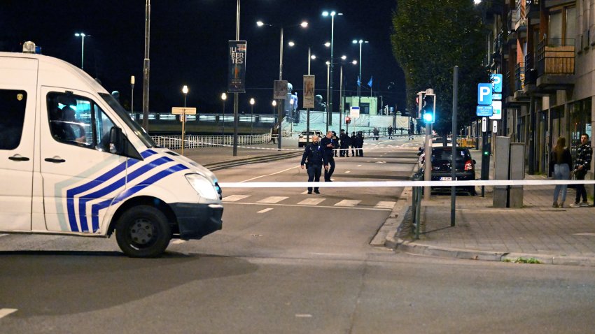 BRUSSELS, BELGIUM – OCTOBER 16: Police cordon off the area as personnel make inspections after a gunman killed at least two Swedish nationals in Brussels, Belgium on October 16, 2023. (Photo by Dursun Aydemir/Anadolu via Getty Images)