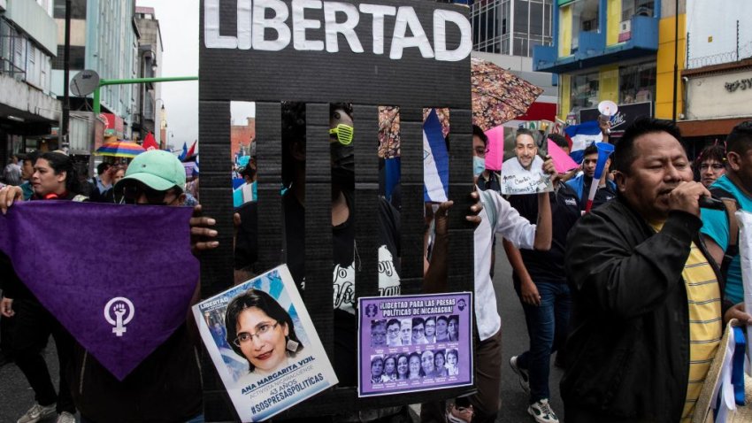 Nicaraguans opposed to the government of President Daniel Ortega march in Costa Rica demanding the release of political prisoners and against the municipal elections held in their country in San Jose on November 6, 2022. – Some 3.7 million Nicaraguans over 16 years of age, out of a population of 6.6 million, were called to vote on November 6 to elect the mayors, vice mayors and councillors of Nicaragua’s 153 municipalities, according to data from the Supreme Electoral Council (CSE). (Photo by Ezequiel BECERRA / AFP) (Photo by EZEQUIEL BECERRA/AFP via Getty Images)