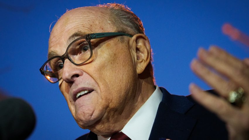 Rudy Giuliani, the former personal lawyer for former U.S. President Donald Trump, speaks to the press as he leaves the E. Barrett Prettyman U.S. District Courthouse on December 11, 2023 in Washington, DC.