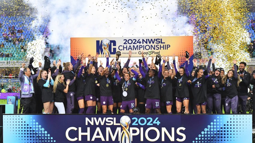 KANSAS CITY, MISSOURI – NOVEMBER 23: Orlando Pride lift the trophyduring the NWSL Championship game between Orlando Pride and Washington Spirit at CPKC Stadium on November 23, 2024 in Kansas City, Missouri. (Photo by Bill Barrett/ISI Photos/Getty Images)