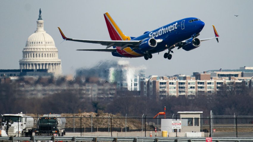 ARLINGTON, VIRGINIA – JANUARY 30: A plane takes off from Reagan National Airport after the crash last night of an American Airlines plane on the Potomac River as it approached the airport on January 30, 2025 in Arlington, Virginia. The American Airlines flight from Wichita, Kansas collided midair with a military Black Hawk helicopter while on approach to Ronald Reagan Washington National Airport. According to reports, there were no survivors among the 67 people on both aircraft. (Photo by Al Drago/Getty Images)
