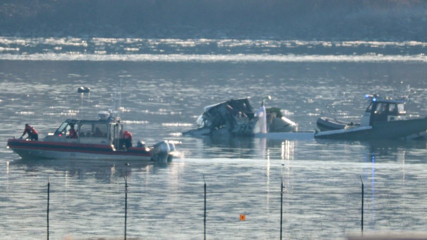 ARLINGTON, VIRGINIA – JANUARY 30:  Emergency response units search the crash site of an American Airlines plane on the Potomac River after an accident last night while on approach to Reagan National Airport on January 30, 2025 in Arlington, Virginia. The American Airlines flight from Wichita, Kansas collided midair with a military Black Hawk helicopter while on approach to Ronald Reagan Washington National Airport. According to reports, there were no survivors among the 67 people on both aircraft.  (Photo by Kayla Bartkowski/Getty Images)