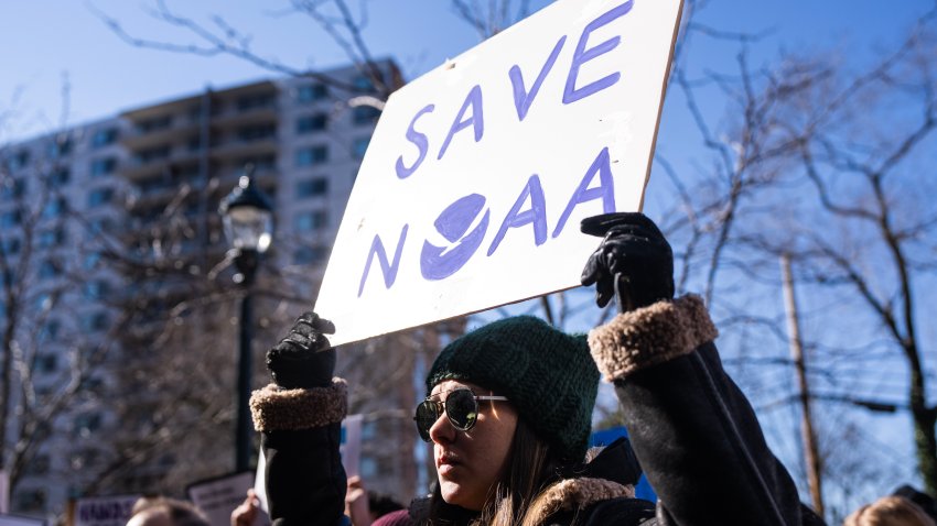 UNITED STATES – MARCH 3: Demonstrators attend rally outside National Oceanic and Atmospheric Administration headquarters to oppose the recent worker firings, in Sliver Spring, Md., on Monday, March 3, 2025. Sen. Chris Van Hollen, D-Md., and other members of Congress also attended. (Tom Williams/CQ-Roll Call, Inc via Getty Images)