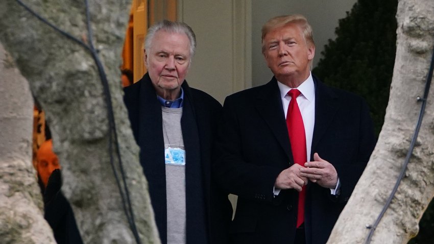 US President Donald Trump (R) stands with actor Jon Voight outside the Oval Office before departing from the South Lawn of the White House in Washington, DC on January 28, 2020. (Photo by MANDEL NGAN / AFP) (Photo by MANDEL NGAN/AFP via Getty Images)