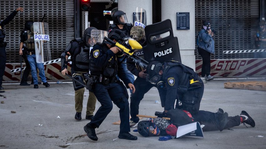 Los Angeles, CA – June 06: DHS police arrest at demonstrator during a protest outside the Metropolitan Detention Center in response to ICE raids in Los Angeles on Friday, June 6, 2025 in Los Angeles, CA. (Jason Armond / Los Angeles Times via Getty Images)